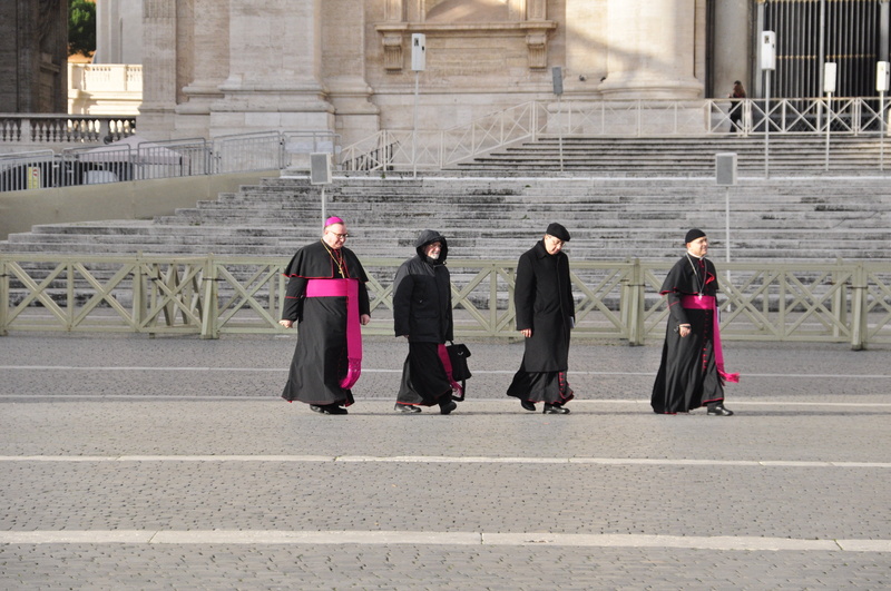 belief, women, rear view, road, building exterior, italy, built structure, men, architecture, lifestyles, bishop, clothing, religion, traditional clothing