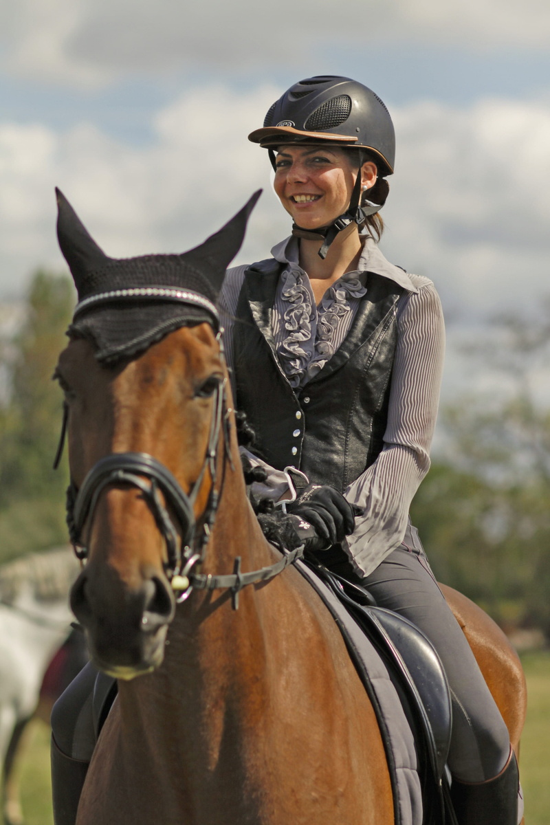 woman, jockey, outdoors, livestock, horsewoman, activity, cheerful, sporty, one person, focus on foreground, animal, riding, portrait, 2K, herbivorous
