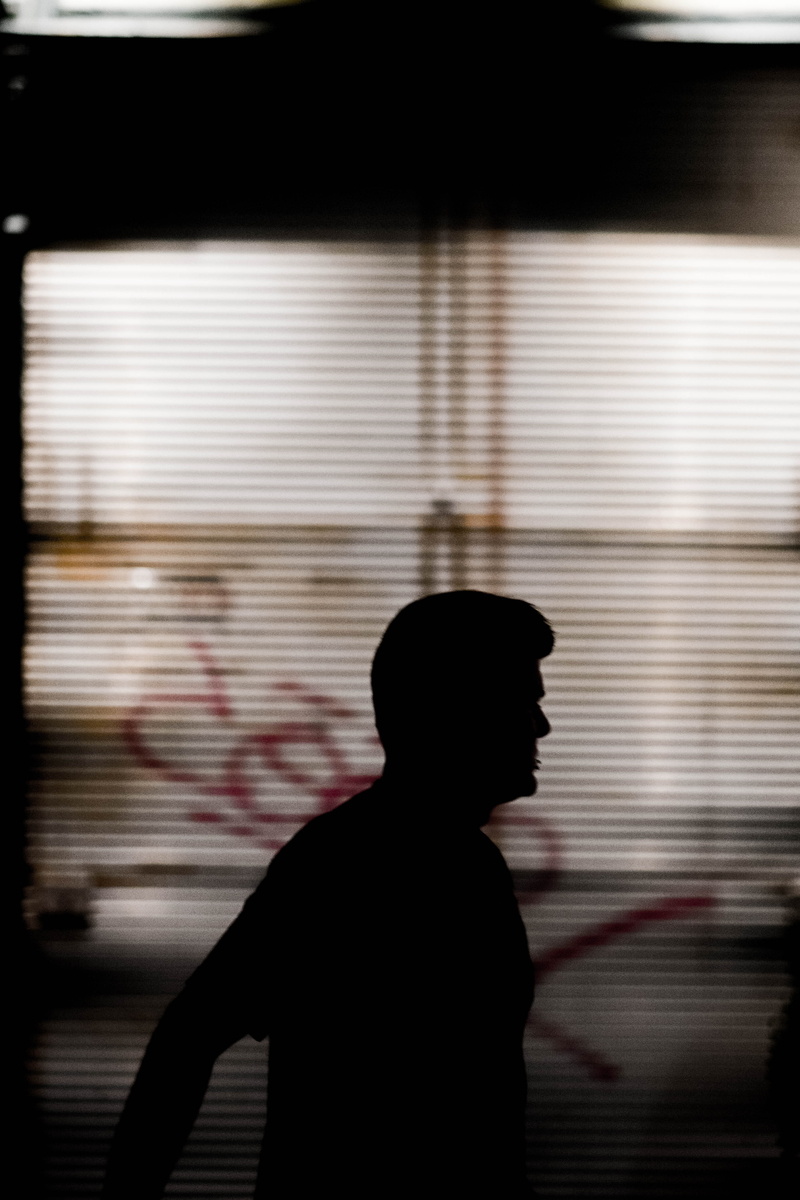 side view, indoors, motion, leisure activity, blurred motion, architecture, sillouette, night time, unrecognizable person, lifestyles, photo, real people