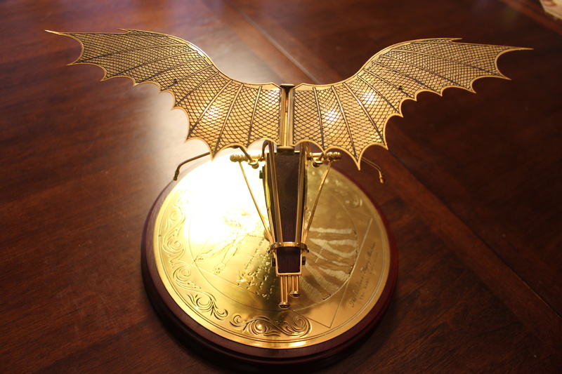 focus on foreground, aeronautical, history, gold colored, 5K, inspiration, wood - material, still life, classic, creativity, high angle view, electric lamp