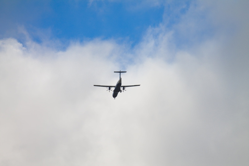 air, transportation, outdoors, nature, motion, plane, commercial airplane, low angle view, sky, travel, airplane, mid-air, cloud - sky, aerobatics, overcast