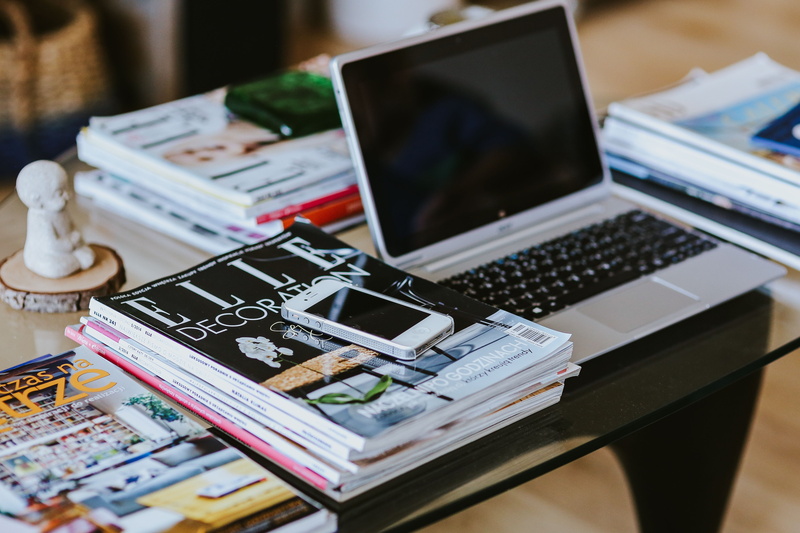 currency, photograph, business, magazines, close-up, indoors, computer, communication, notebook, stack, still life, coffee, table, cups, high angle view