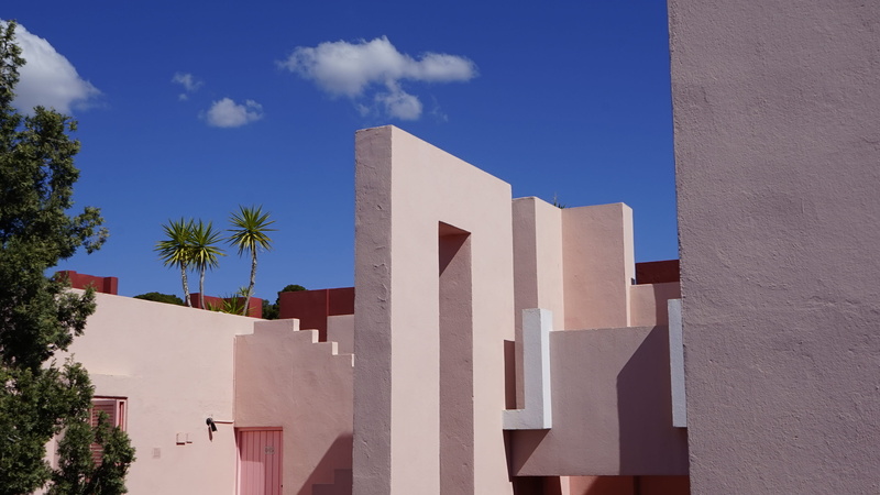 wall - building feature, urban, monument, built structure, palm tree, plant, housing, cloud - sky, no people, nature, column, travel, architecture, blue