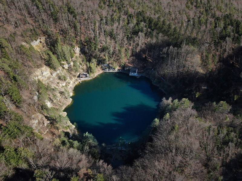 growth, non-urban scene, crater, no people, nature, travel, beauty in nature, eye, volcanic crater, outdoors, water, lake, view, day, switzerland