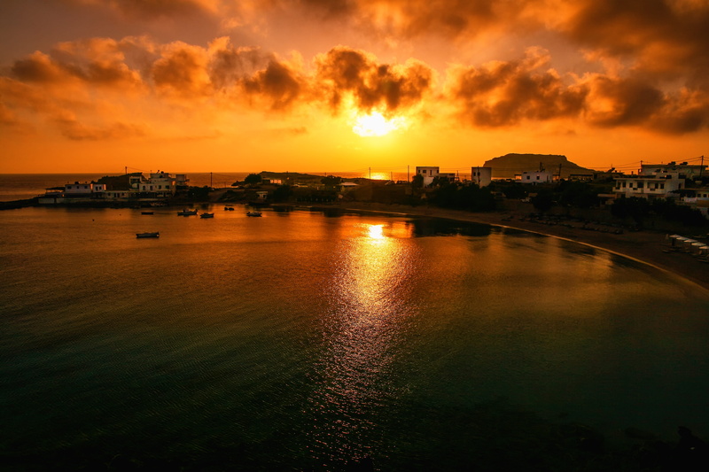 sunset, bay, building exterior, dusk, outdoors, orange color, mood, architecture, no people, karpathos island, nature, city, building, holiday, built structure