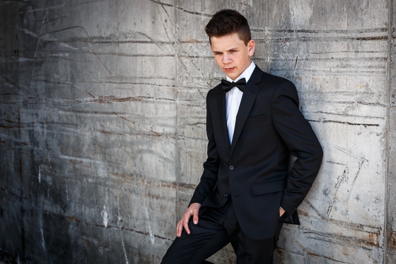 suit, beautiful people, formalwear, celebration, young adult, handsome, christianity, adult, wall - building feature, religion, bow tie, rustic, fashion
