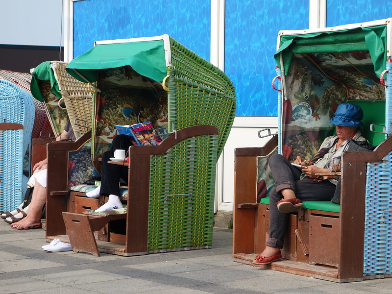 adult, relaxation, sunlight, casual clothing, architecture, enjoy, lifestyles, chair, clubs, day, clothing, wind protection, relax, built structure, human
