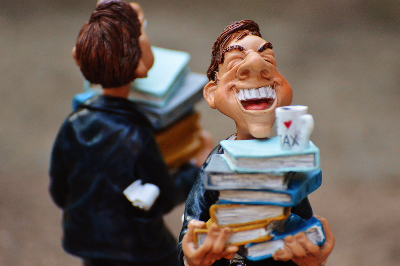 laughing, females, adult, focus, couple - relationship, man, togetherness, taxes, happiness, pile, selective, mouth, excitement, young adult, funny, books