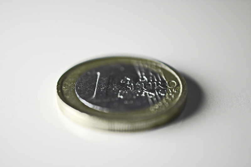 selective focus, loose change, colored, white background, metal, geometric shape, luxury, 2K, business, currency, indoors, shape, gold, silver colored