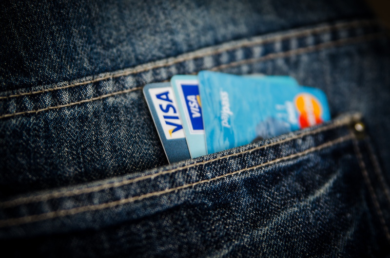 business, shopping, no people, close-up, money, textile, card, cards, clothing, mastercard, communication, flag, blue, buy, several, jeans, visa, still life