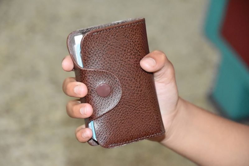 money, human body part, leisure activity, cash, day, close-up, outdoors, real people, finger, focus on foreground, human finger, unrecognizable person