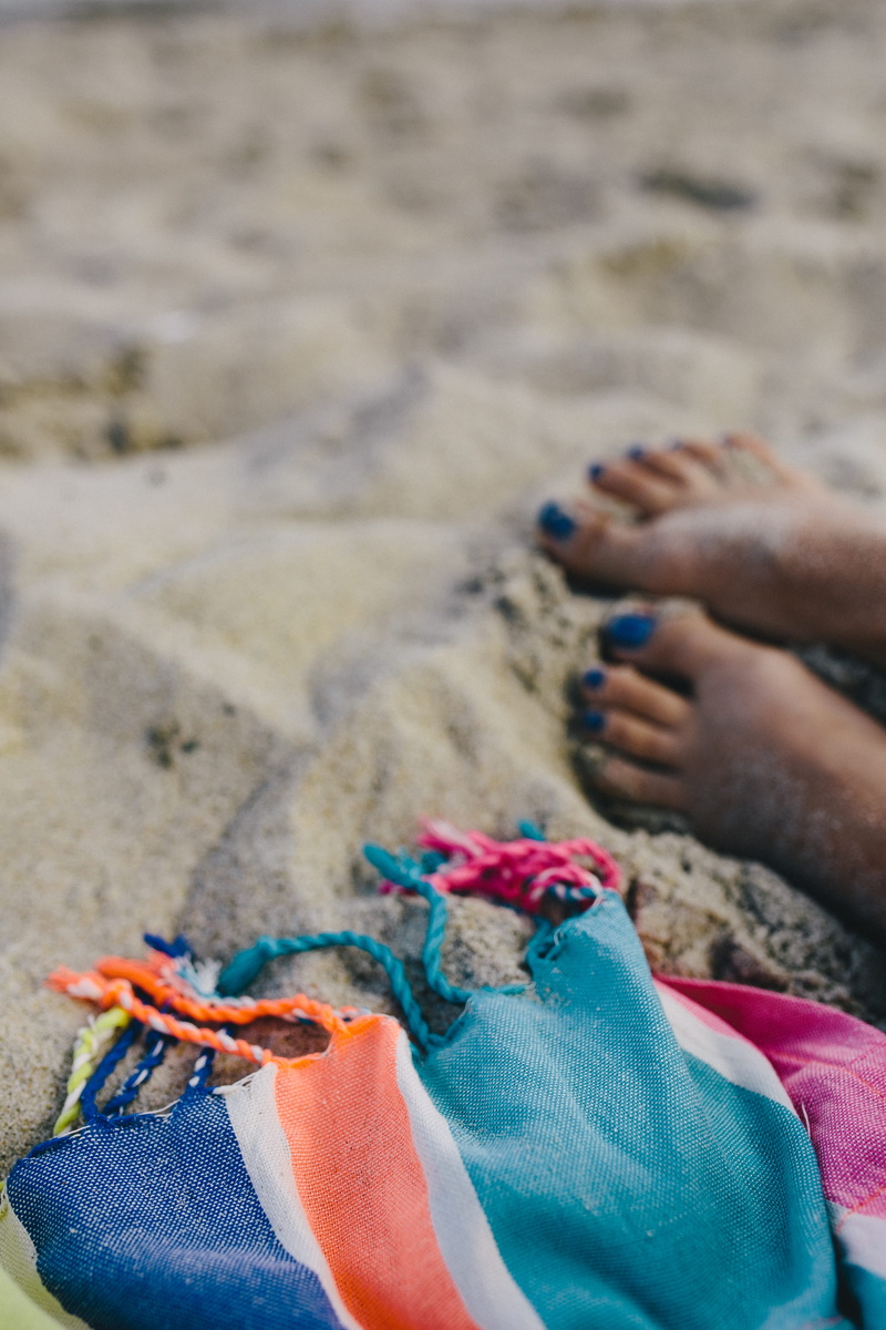 textile, human hand, one person, feet, leisure activity, vacations, holidays, selective focus, human foot, beach, summer, land, high angle view, coastline