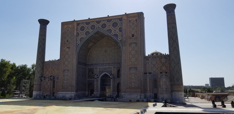 incidental people, madrasa, building exterior, outdoors, built structure, city, the past, history, architecture, sky, travel, place of worship, travel destinations