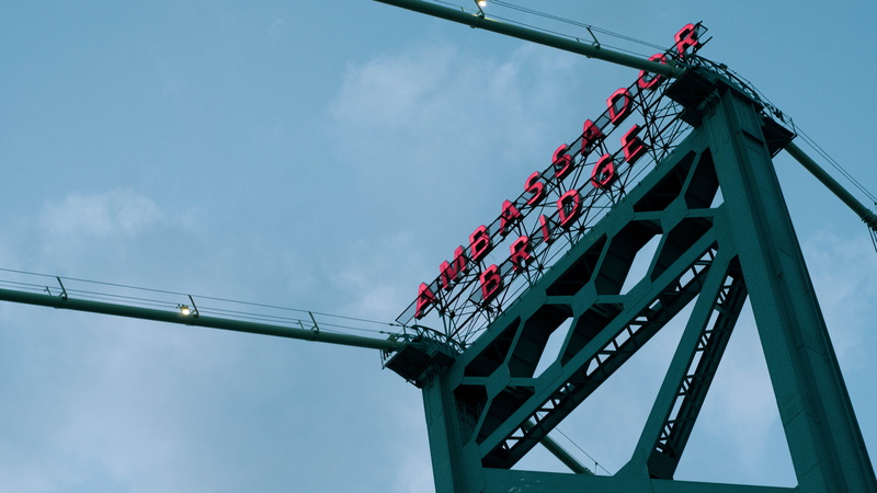 architecture, built structure, bridge - man made structure, construction industry, leisure activities, blue, building, construction, day, drink, low angle view