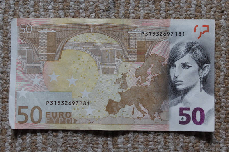 non-western script, video, art and craft, dream factory, number, hollywood, human representation, camera, female likeness, creativity, paper currency, text