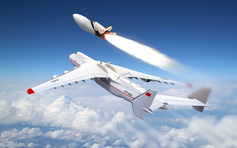 air vehicle, blue, Airplane, outdoors, plane, sky, aircraft wing, mid-air, flying, Antonov An-225 Mriya, mode of transportation, single object, nature
