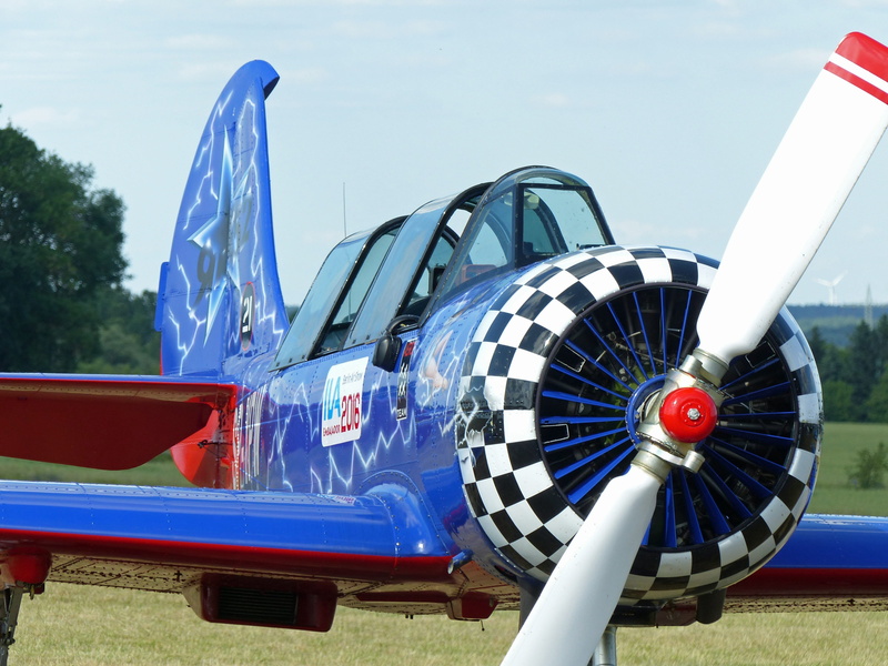 air vehicle, transportation, patriotism, nature, no people, most famous aerobatic plane, yak 52, war, sport, aircraft, travel, land vehicle, pattern, blue