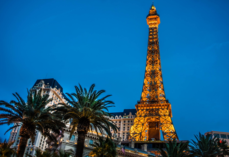 tower, tourism, vacation, palm trees, romantic, sky, casino, tall - high, fun, architecture, building exterior, city, las vegas, blue, cityscape, excitement