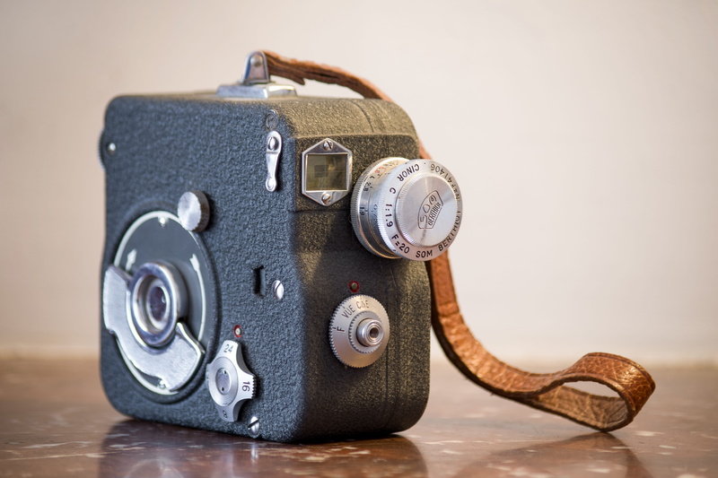 toy, camera - photographic equipment, retro styled, grey, motion, mechanical, history, lens - optical instrument, 4K, old, vintage, still life, colored background