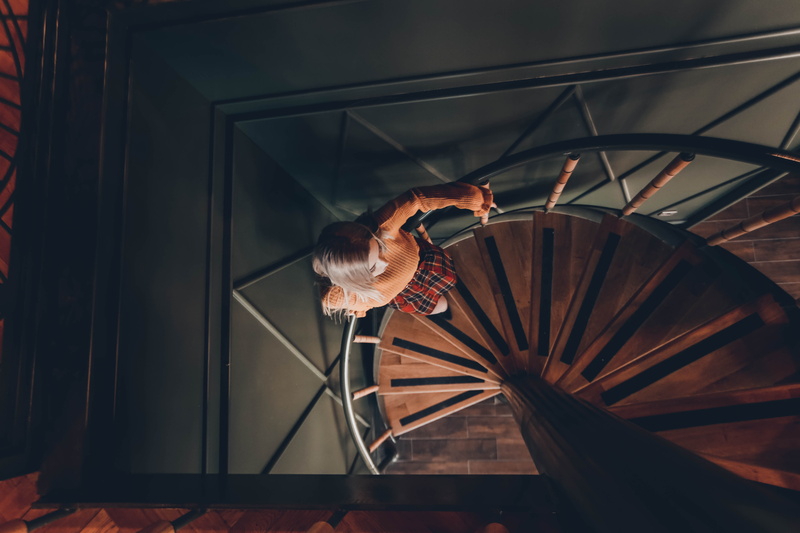 spiral staircase, banister, one person, athlete, interior design, women, human, sport, tire, adult, adventure, spiral, steps and staircases, circus, handrail