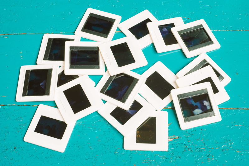 wood - material, directly above, photography, analog, 2K, table, slides, picture frame, equipment, blue, slide, medium, instant camera, photographer, no people