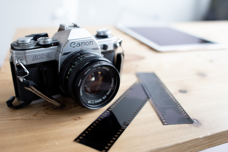 antique, the media, film slide, indoors, camera film, technology, photography themes, desk, strap, hardware, camera - photographic equipment, canon, wood desk