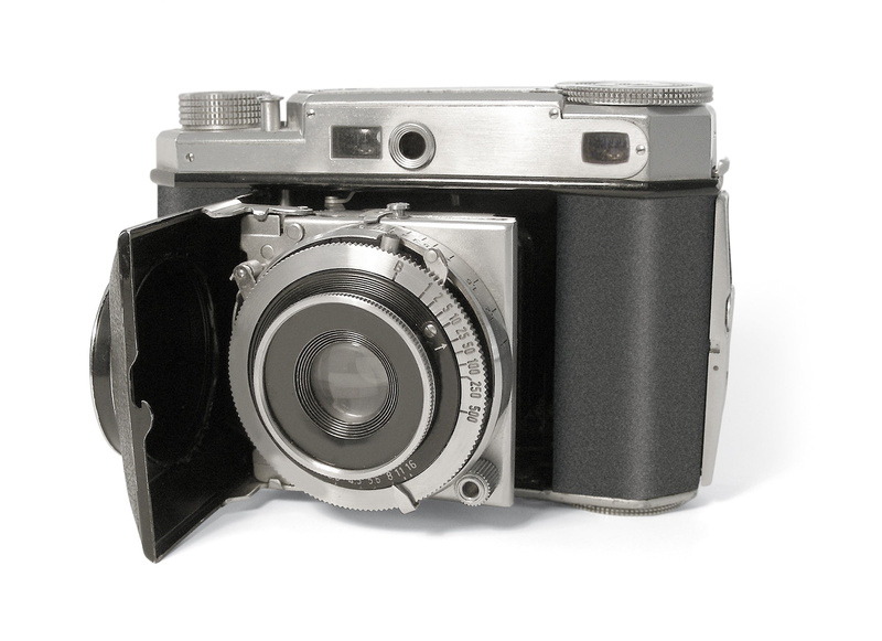digital camera, analog, lens - eye, still life, electrical equipment, photographer, recording, kleinbild film, white background, black color, slr camera
