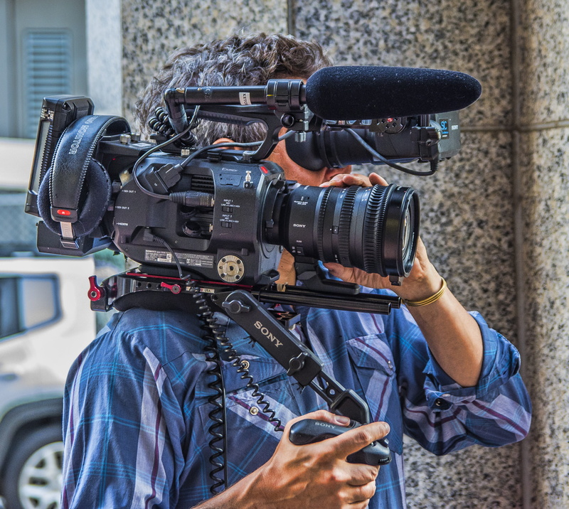 filming, adult, occupation, broadcast, the media, camera - photographic equipment, photography themes, operator, holding, media, television camera, real people