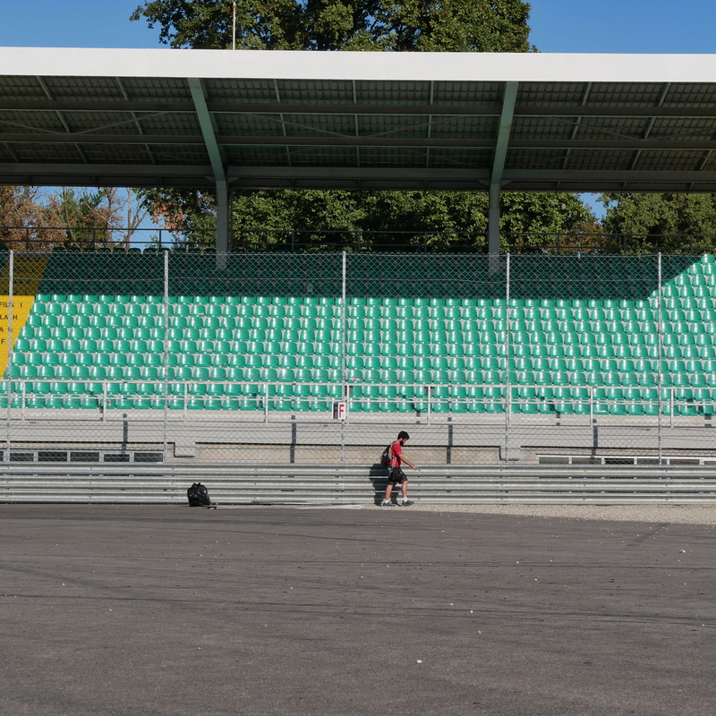 built structure, blue, architecture, tribune, outdoors, lifestyles, full length, 2K, childhood, sunlight, shadow, monza, day, nature, men, autodrome, one person