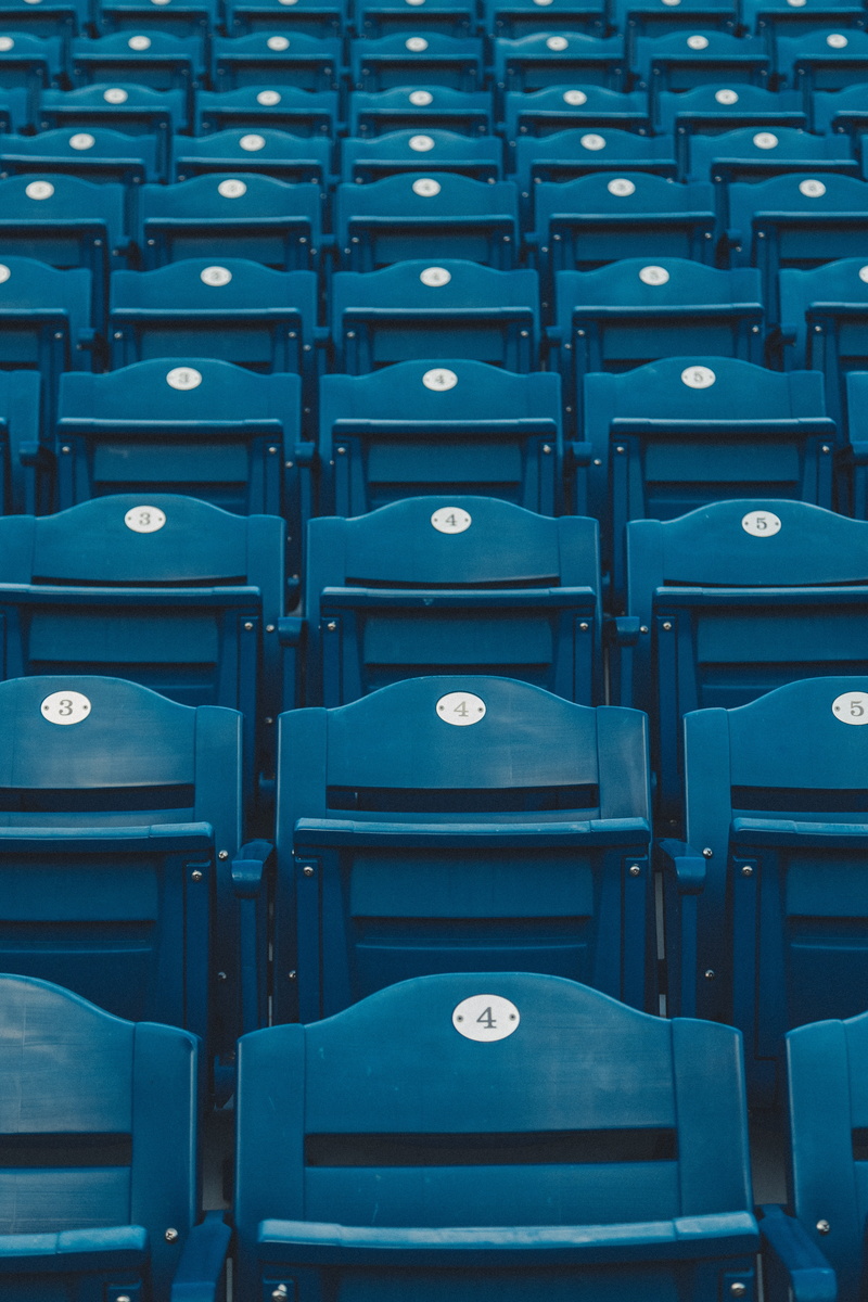 no people, in a row, seats, repetition, indoors, side by side, tribune, group of objects, backgrounds, 5K, wooden, furniture, seat, chair, number, full frame
