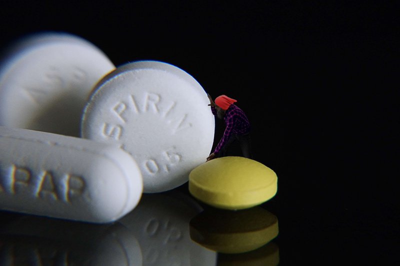 food and drink, sweet, tablets, aspirin, dwarf, black background, no people, disease, text, food, still life, studio shot, sweet food, close-up, indoors