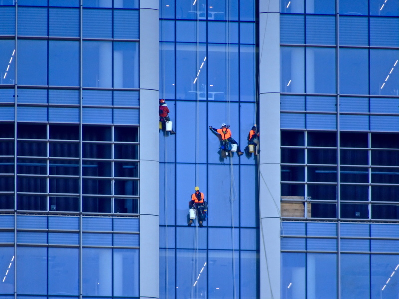 two people, office, office building exterior, cleaning, outdoors, glass - material, architecture, 4K, glass, built structure, working, clean, uniform
