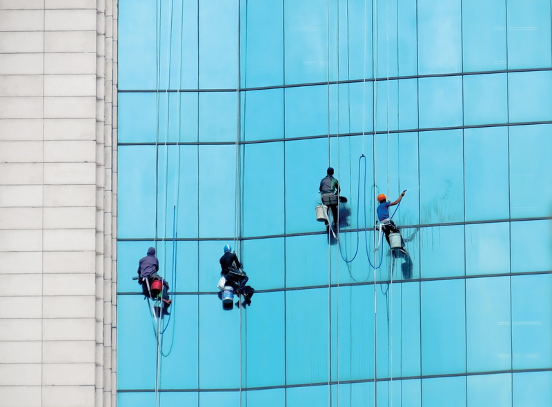 the cleanup, cleaner, vietnam, building exterior, day, window washer, office, architecture, hanoi, real people, outdoors, spider-man, working, building