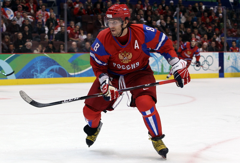 full length, stadium, sport, winter, real people, russian, people, ice, stick, helmet, incidental people, cold temperature, Sports, crowd, alexander, skill