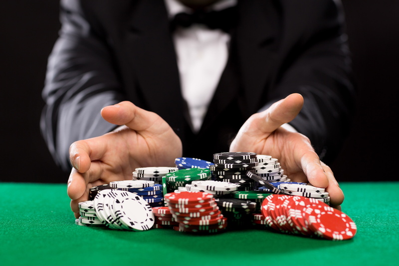 one person, table, black background, front view, hand, casino, luck, leisure activity, gambling, playing, poker, adult, leisure games, relaxation, 4K