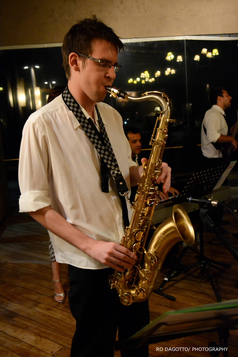 artist, young adult, waist up, music, holding, arts culture and entertainment, photography, performance, trumpets, saxophonist, young men, front view, glasses