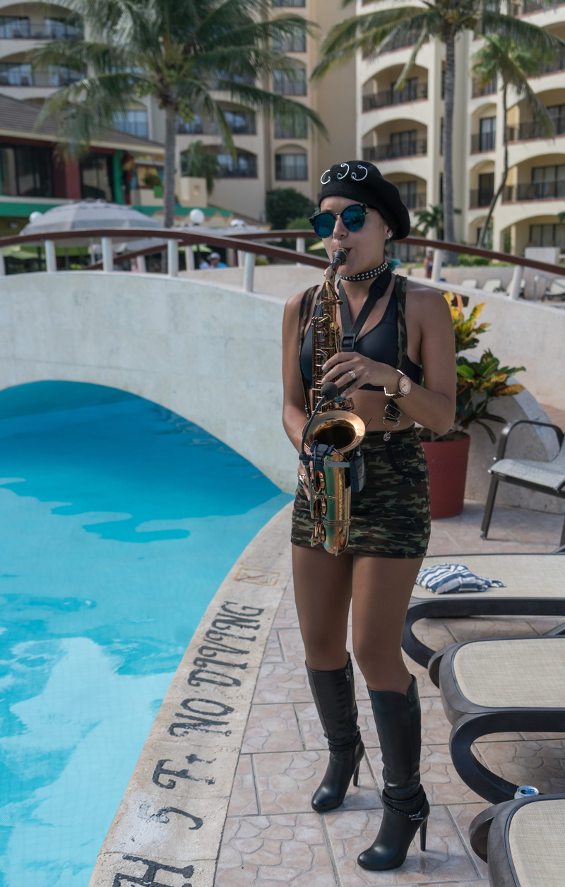 performance, beautiful woman, glasses, sunglasses, young adult, leisure activity, poolside, water, swimming pool, outdoors, real people, music, people
