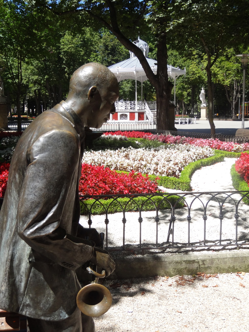 male likeness, jazz, art and craft, built structure, creativity, flowering plant, statue, nature, outdoors, sculpture, landscape, plant, human representation