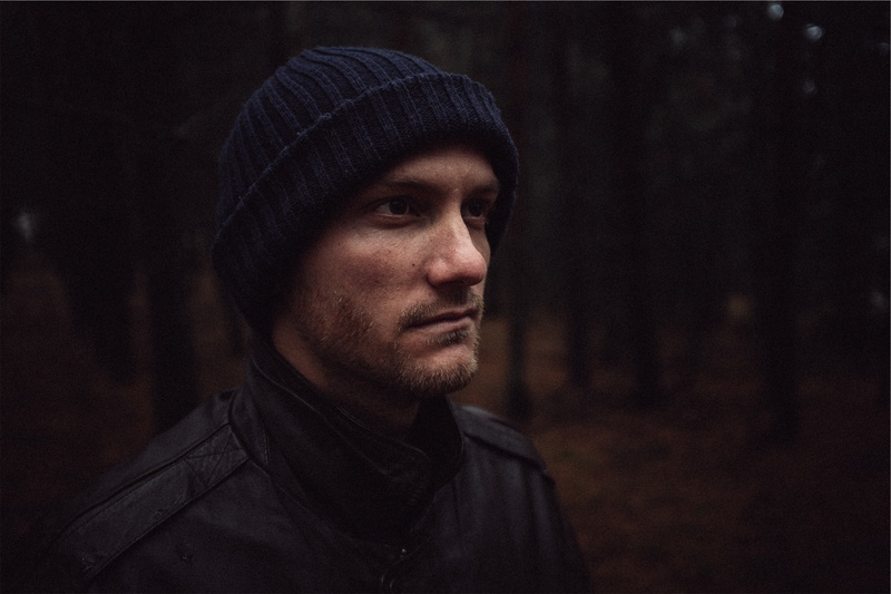 model, headshot, clothing, human face, dirty, knit, young men, serious, city, face, right, man, portrait, dark, social issues, light, cap, jacket, hat
