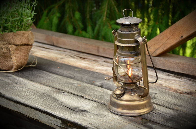 wooden structure, kerosene, burner, gold, food and drink, focus on foreground, light, oil lamp, rustic, lamp, outdoors, electric lamp, kerosene lamp, table