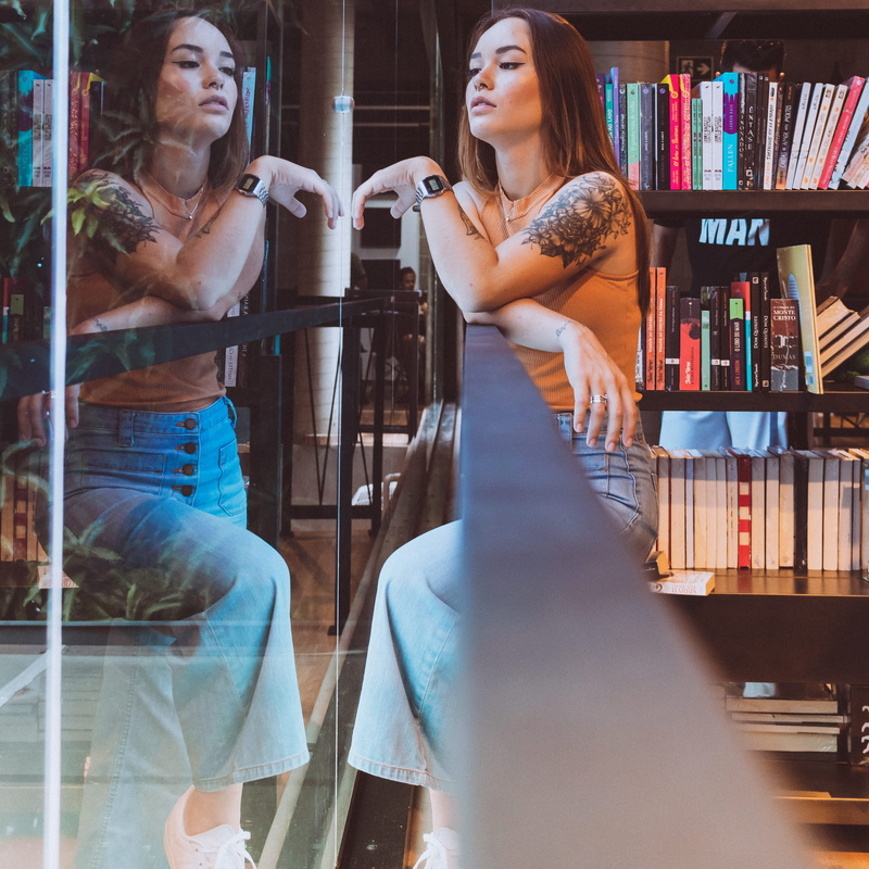 city, portrait, jeans, education, fashion, reflection, adult, glass, wall, young adult, transparent, library, facial expression, book, publication, mirror