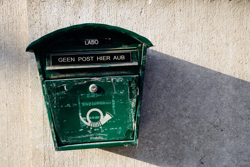outdoors, communication, beat up, green, wall, no people, mailbox, letter box, telephone, antwerp, mounted, worn, connection, receive, post box, postbox