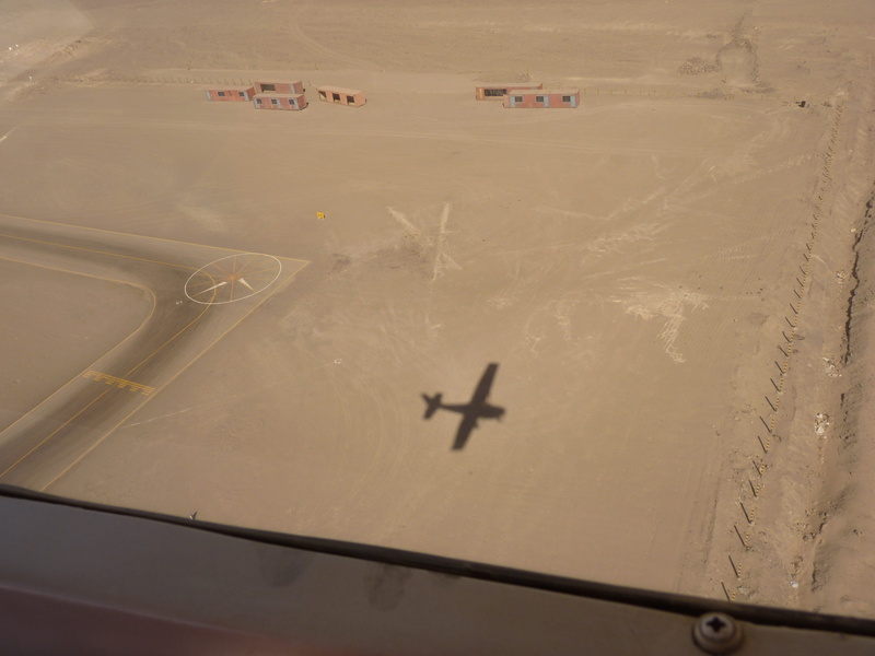 aircraft, transparent, outdoors, air vehicle, travel, high angle view, airport runway, 4K, sunlight, desert, flying, glass - material, nazca, day, transportation