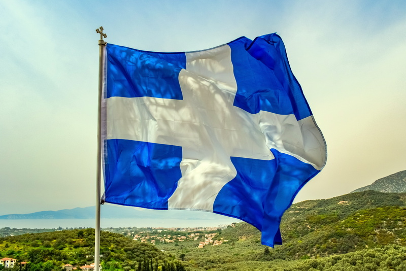 day, shape, wind, patriotism, nature, blue and white, low angle view, greek flag, emotion, sky, cloud - sky, symbol, mountain, blue, flag, no people, nation