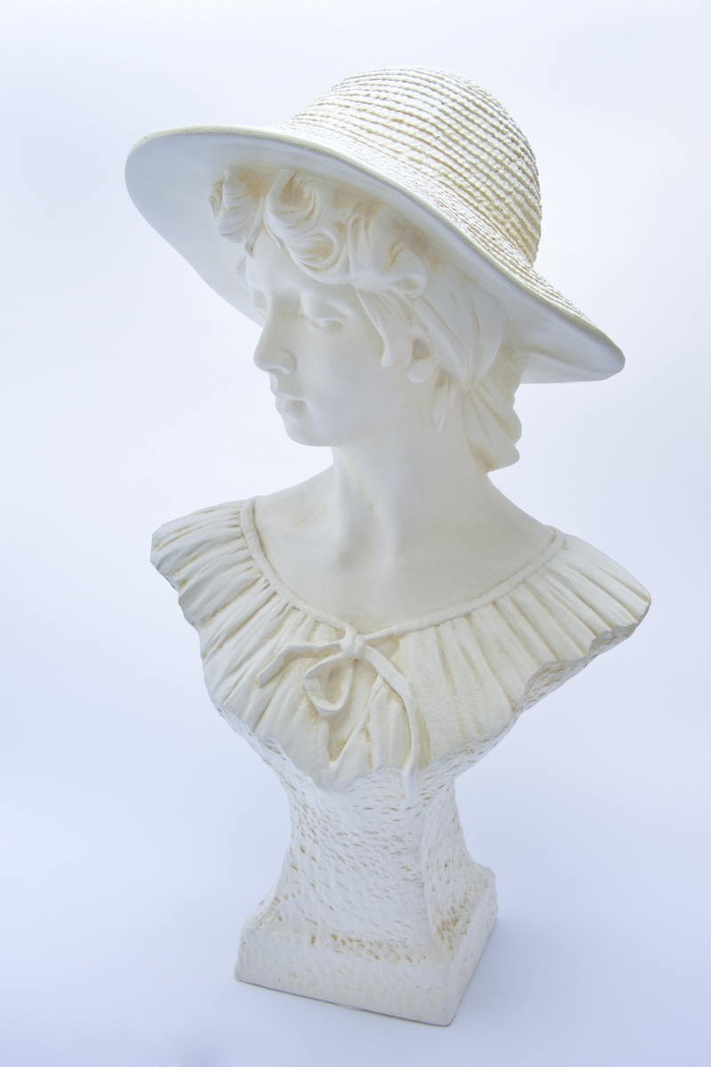 hat, studio shot, ornament, figure, gypsum, still life, craft, antique, statue, nature, indoors, white background, day, female likeness, close-up, sculpture