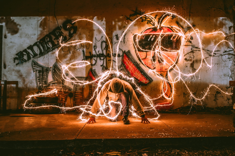 creativity, animal, steel, illuminated, wall - building feature, architecture, motion, squatting, blurred motion, night, no people, graffiti, full length