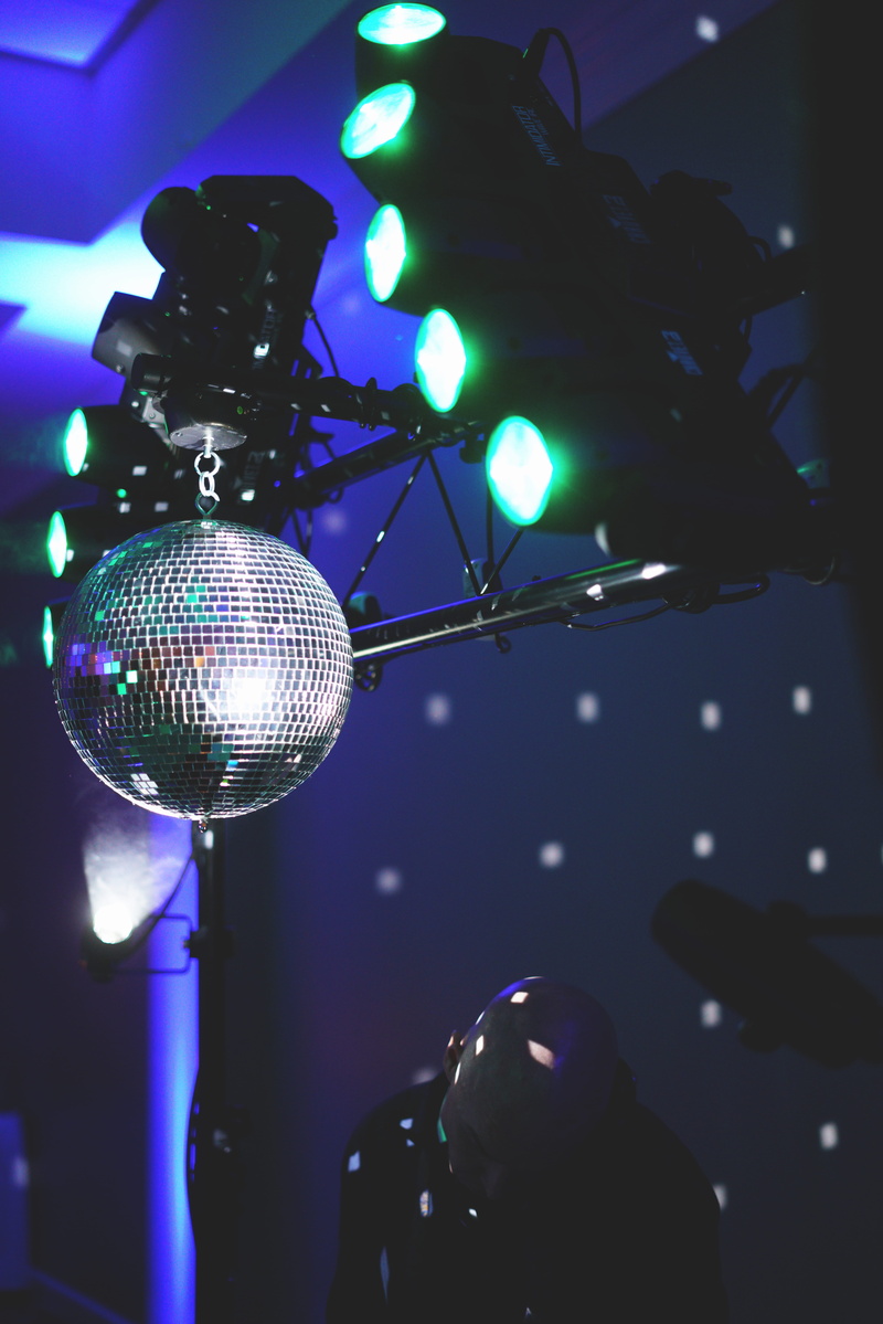 party - social event, lights, blue, ceiling, disco, stage - Performance Space, silver, person, event, indoors, focus on foreground, decoration, real people