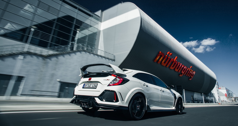 one person, racecar, motor racing track, built structure, motor vehicle, land vehicle, car, type-r, red, communication, outdoors, building exterior, civic