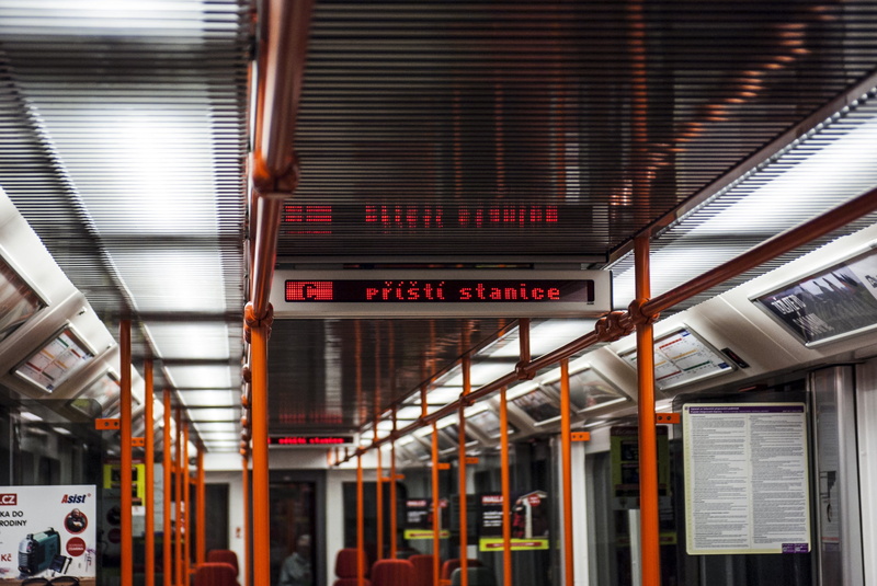 information, land vehicle, indoors, western script, display, mode of transportation, rail transportation, metro letňany, train, 2K, the next station, architecture