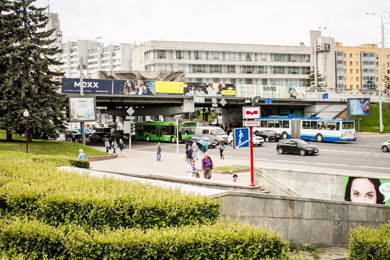 nature, men, city life, land vehicle, city, plant, metro, built structure, minsk, building exterior, sign, building, day, people, text, transportation